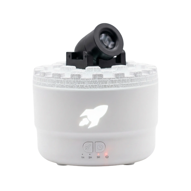 White humidifier with a black top on a white background