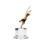 Gold sculpture of a TIGER on a clear crystal base against a white background